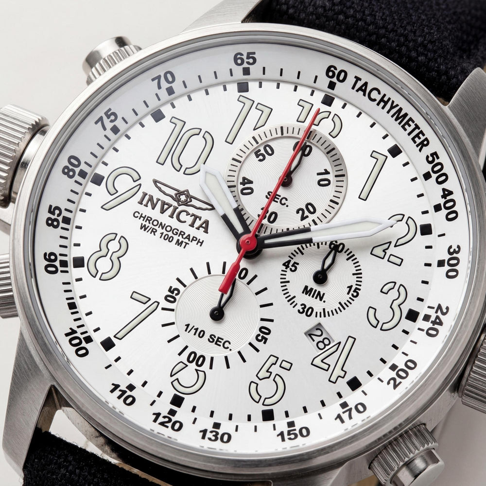 Reloj Invicta para hombre, cronógrafo con corona izquierda, caja de acero inoxidable de 46 mm, esfera blanca, correa de tela y manecillas luminiscentes.