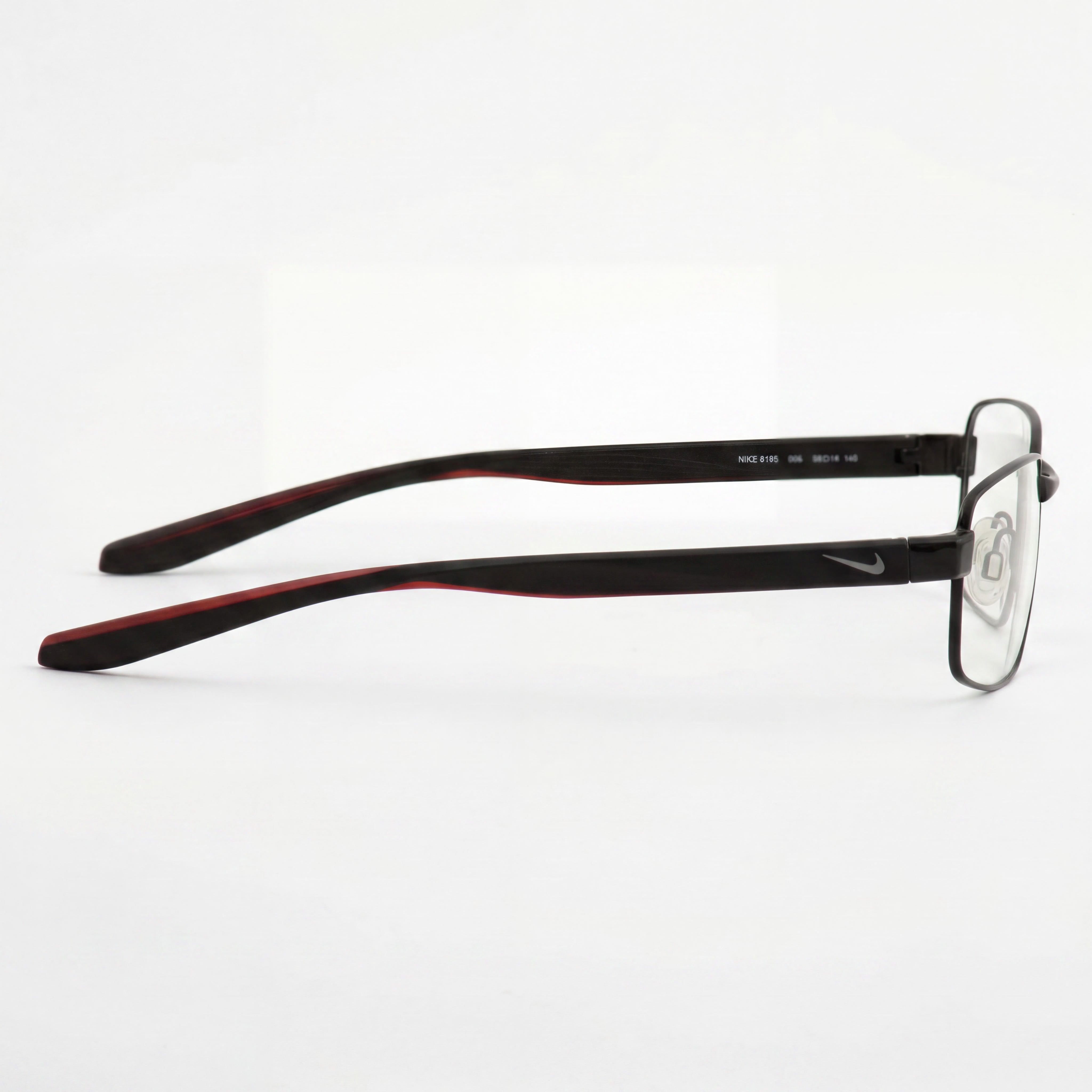 Gafas unisex Nike 8195 con marco de metal negro, diseñadas con un ancho de lente de 58 mm, un ancho de puente de 18 mm y una longitud de patilla de 140 mm., Photo 2