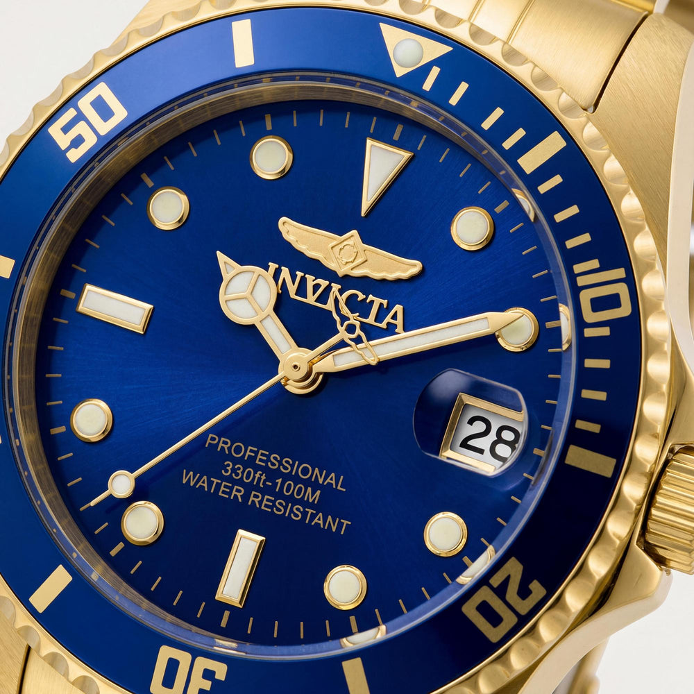 Reloj de buceo de cuarzo Invicta Pro Diver para mujer con fecha, caja dorada y esfera azul de 34 mm.