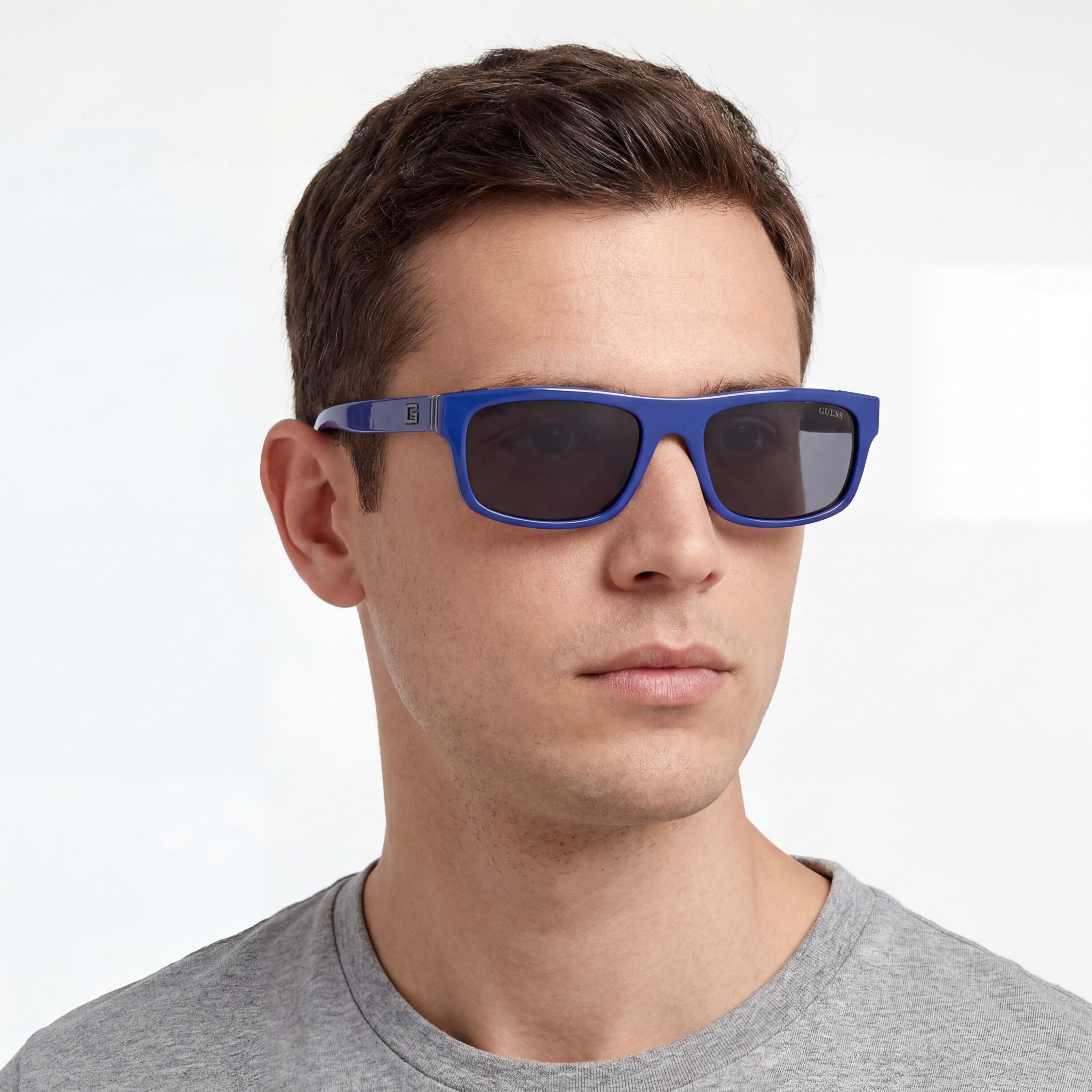 GUESS Casual Men's Sunglasses with Shiny Blue Plastic Frame, Smoke Plastic Non-Polarized Lenses, UV 400 Protection, Size 57-18-145, Photo 5