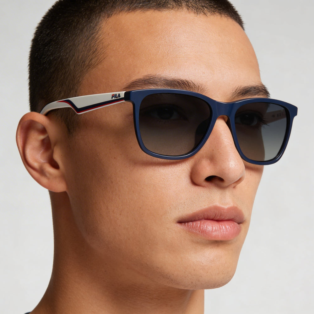Fila Sfi461 para hombre, armazón azul, lentes azules degradados no polarizados de 56 mm con protección UV