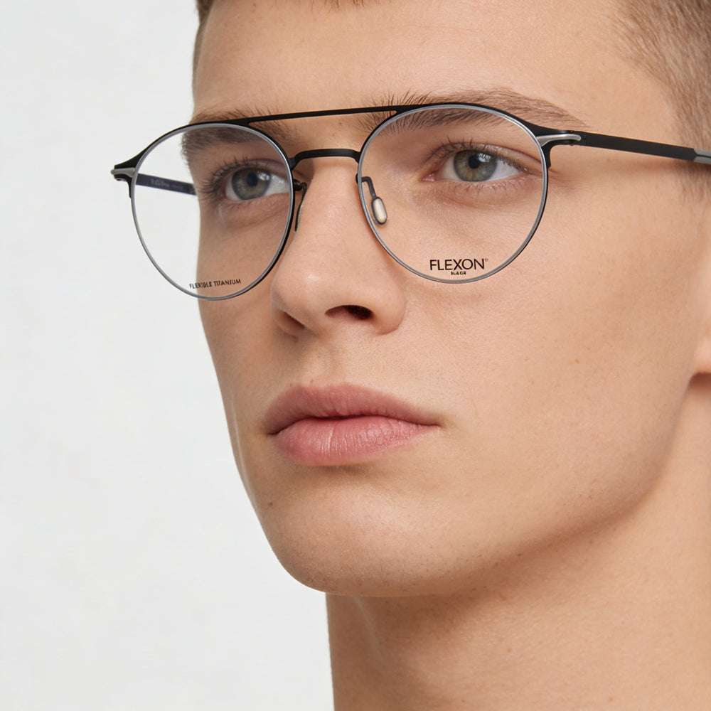Gafas unisex Flexon B2003 con montura de acetato negro, lentes de policarbonato no polarizadas y tamaño 52-20-145.