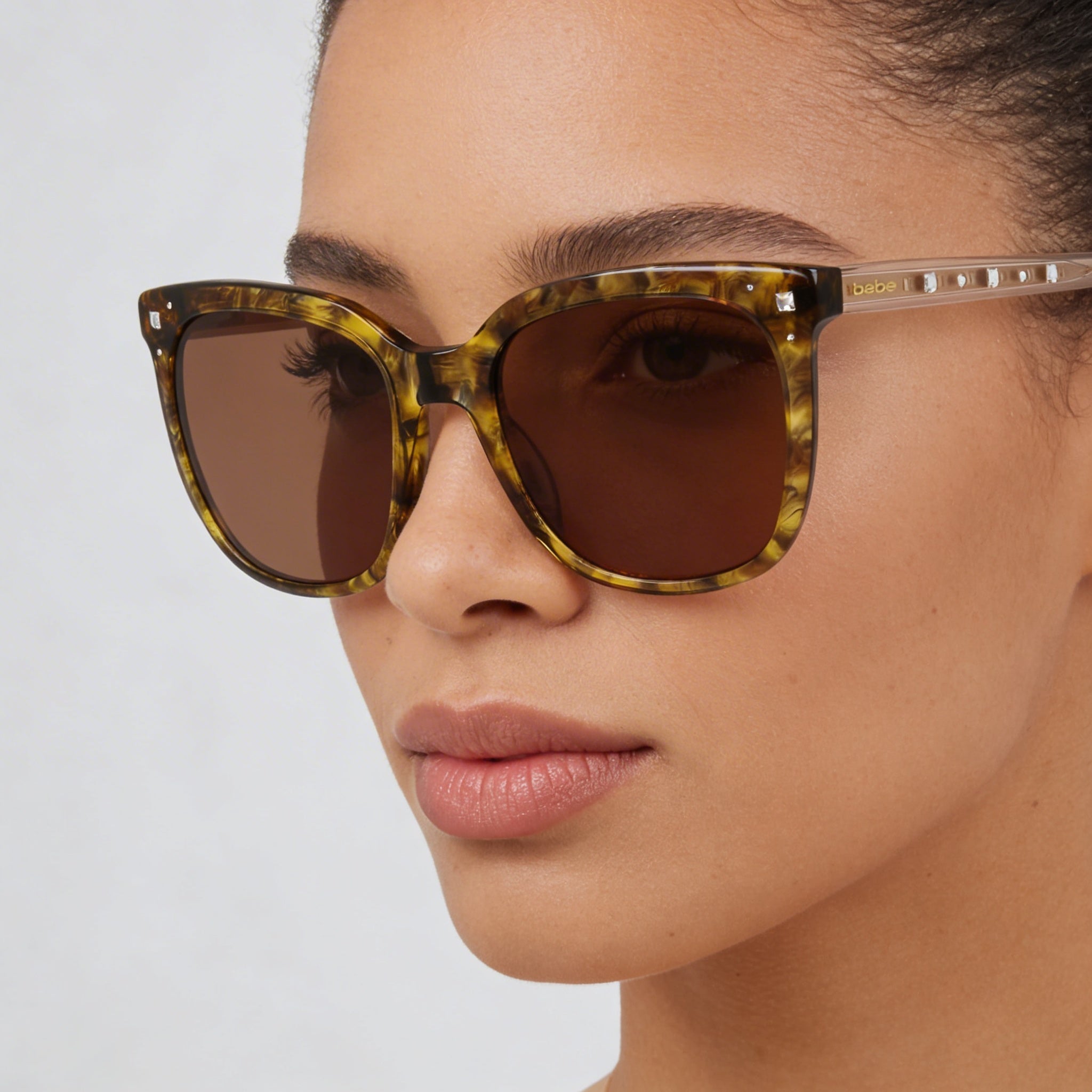 bebe Women's Topaz Plastic Frame Acetate Lens Sunglasses with UV Protection, Photo 5