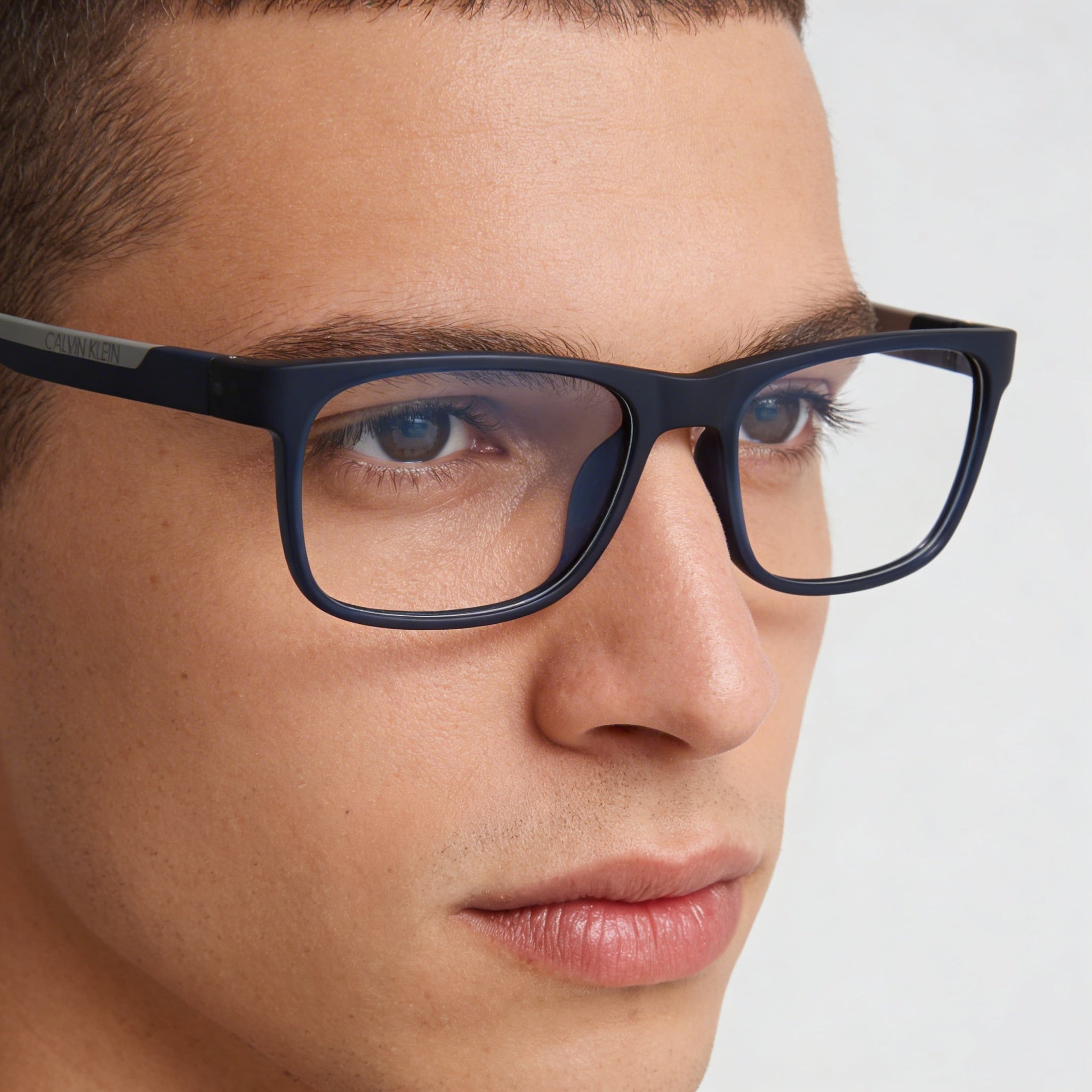 Calvin Klein UNPOLARIZED Men's Square Plastic Frame Non- Eyeglasses, Matte Crystal Navy, 52mm, Photo 4