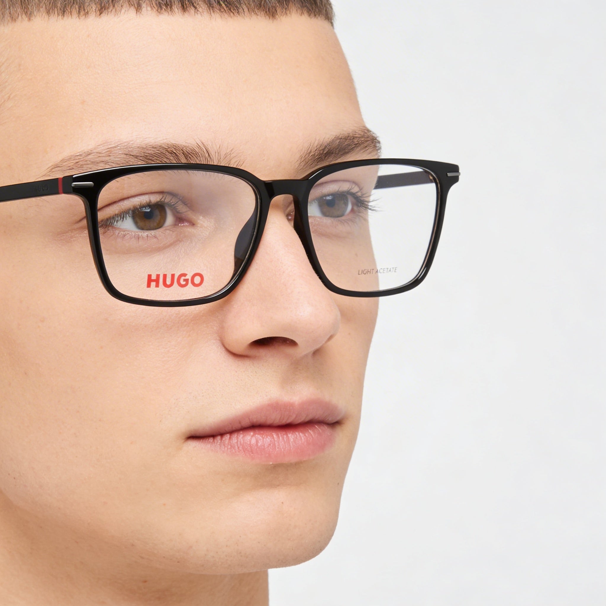 BOSS Audio Systems Gafas de sol modernas unisex con montura de magnesio negro y lentes de policarbonato negro, 55 mm de ancho de lente, Photo 4