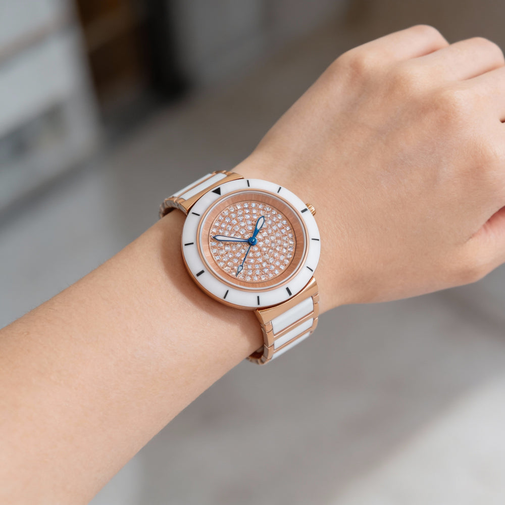 Reloj de cuarzo Oniss Toulon ON7262 para mujer, de acero inoxidable en tono oro rosa, con esfera plateada y cristal mineral resistente a arañazos.