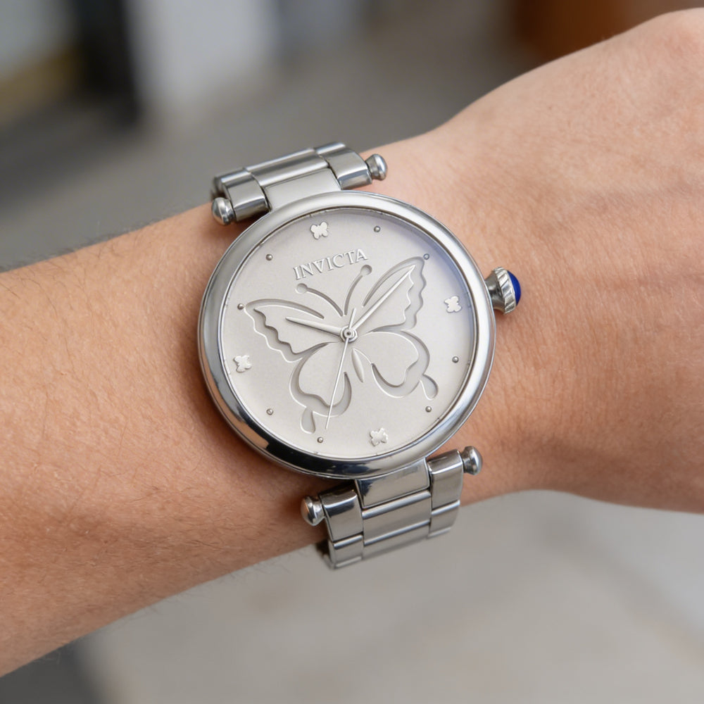Reloj de cuarzo Invicta Wildflower 33232 para mujer con esfera plateada y pulsera de acero inoxidable, caja de 36 mm