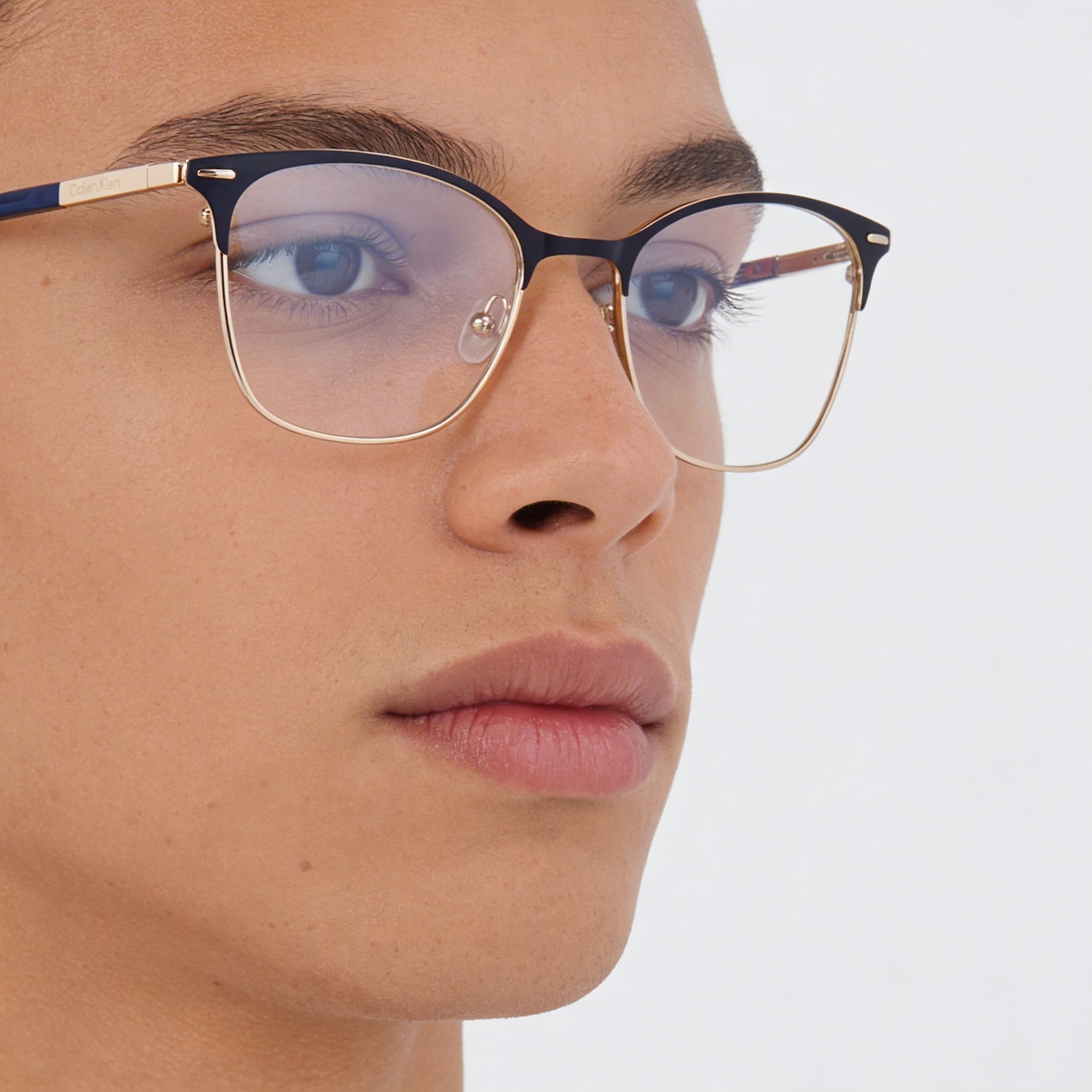 Calvin Klein CK21124 Gafas de estilo moderno unisex con montura metálica azul y lentes de policarbonato azules, tamaño 49-18-140, Photo 4