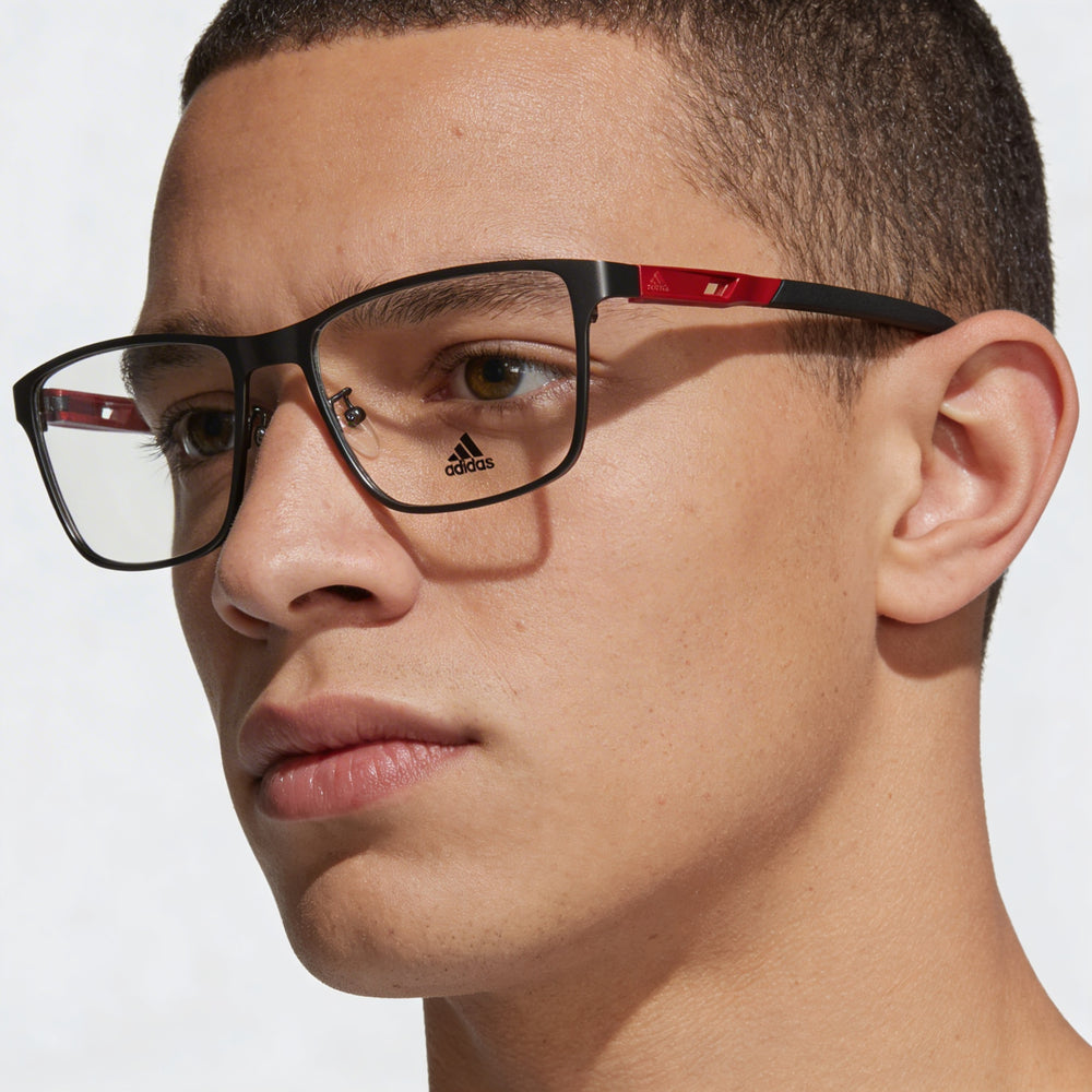 Gafas Adidas Sp5021 para hombre con montura metálica de color gunmetal brillante y lentes transparentes, talla 54-18-140