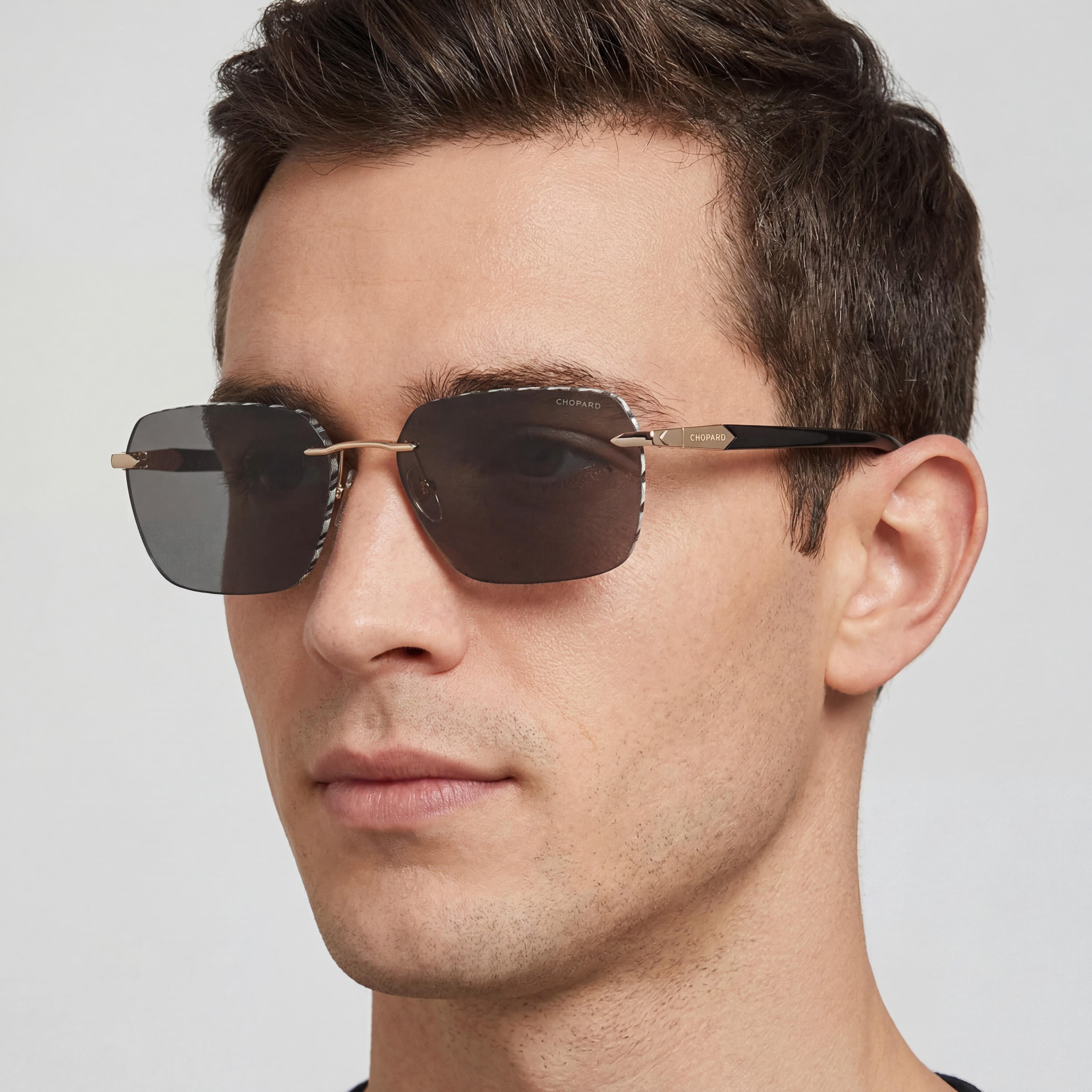 Chopard Gafas de Sol Casuales para Hombre, Montura de Metal Rosa Brillante, Lentes Grises No Polarizadas, Protección UV 61-16-145, Photo 4