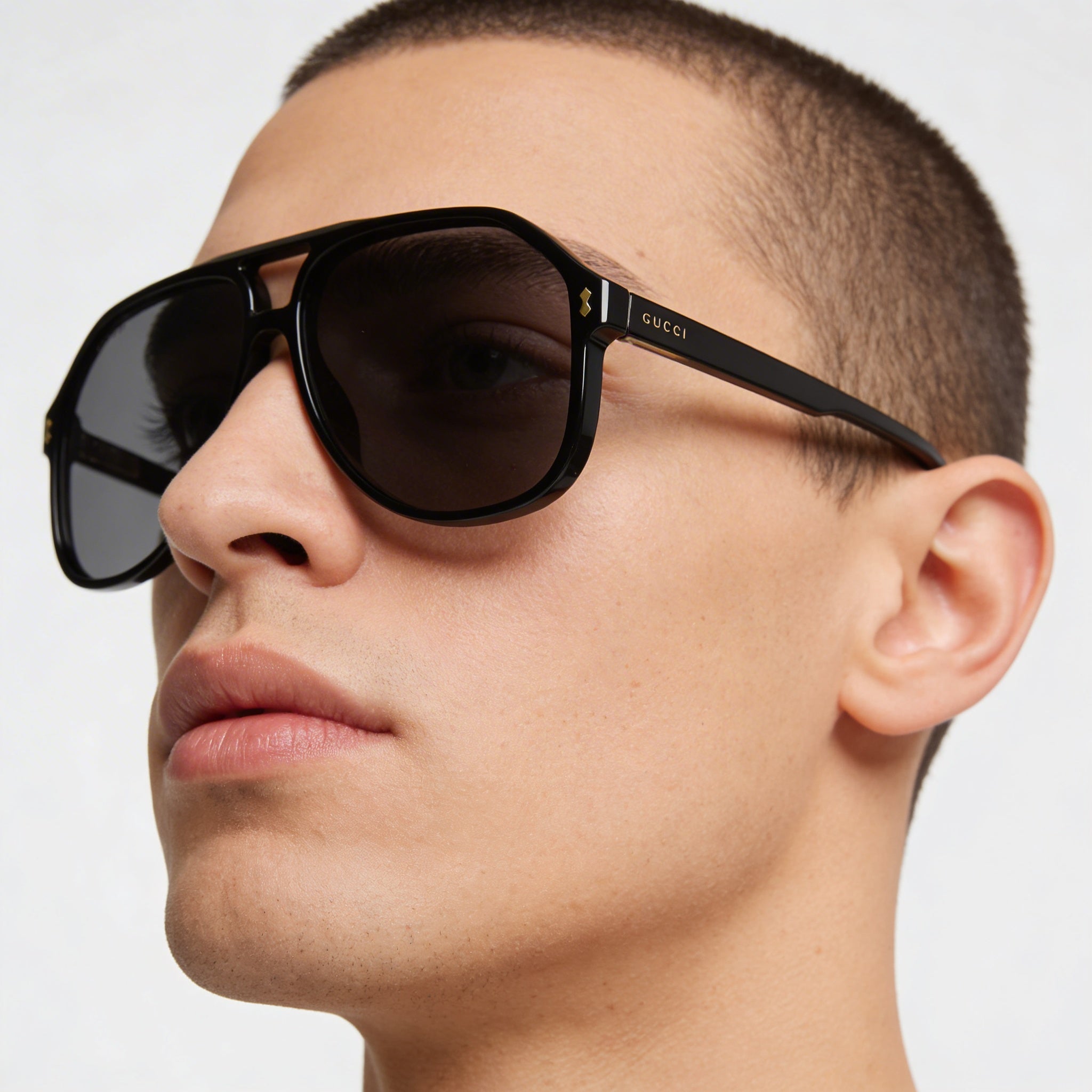 Gucci Men's GG1042S Pilot Non-Polarized Prescription-Ready Sunglasses, Black Gold Logo Plastic Frame, Grey Lenses 60mm, Photo 2