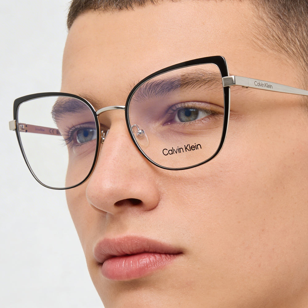 Gafas unisex Calvin Klein CK22101 Cat Eye con montura de metal negro y plateado, lentes de 54 mm de ancho