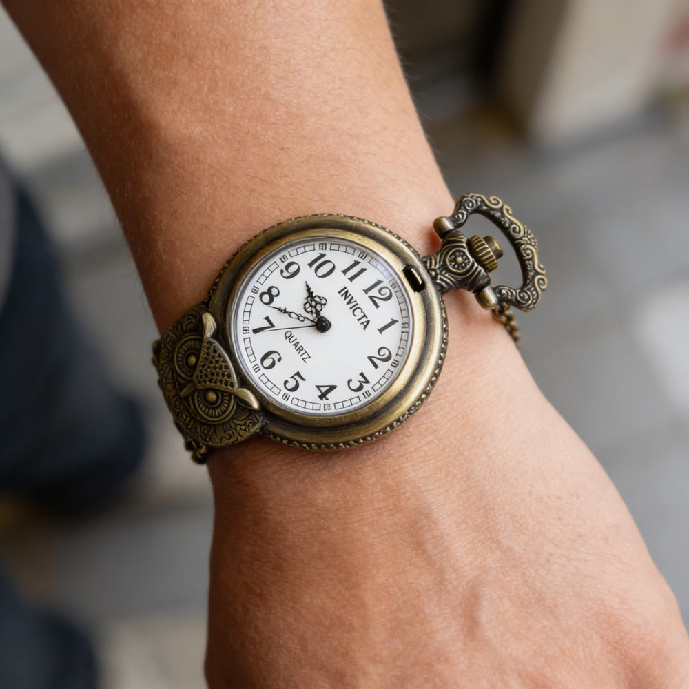 Reloj de cuarzo unisex Invicta Vintage 49001, caja de bronce, esfera blanca, 47 mm