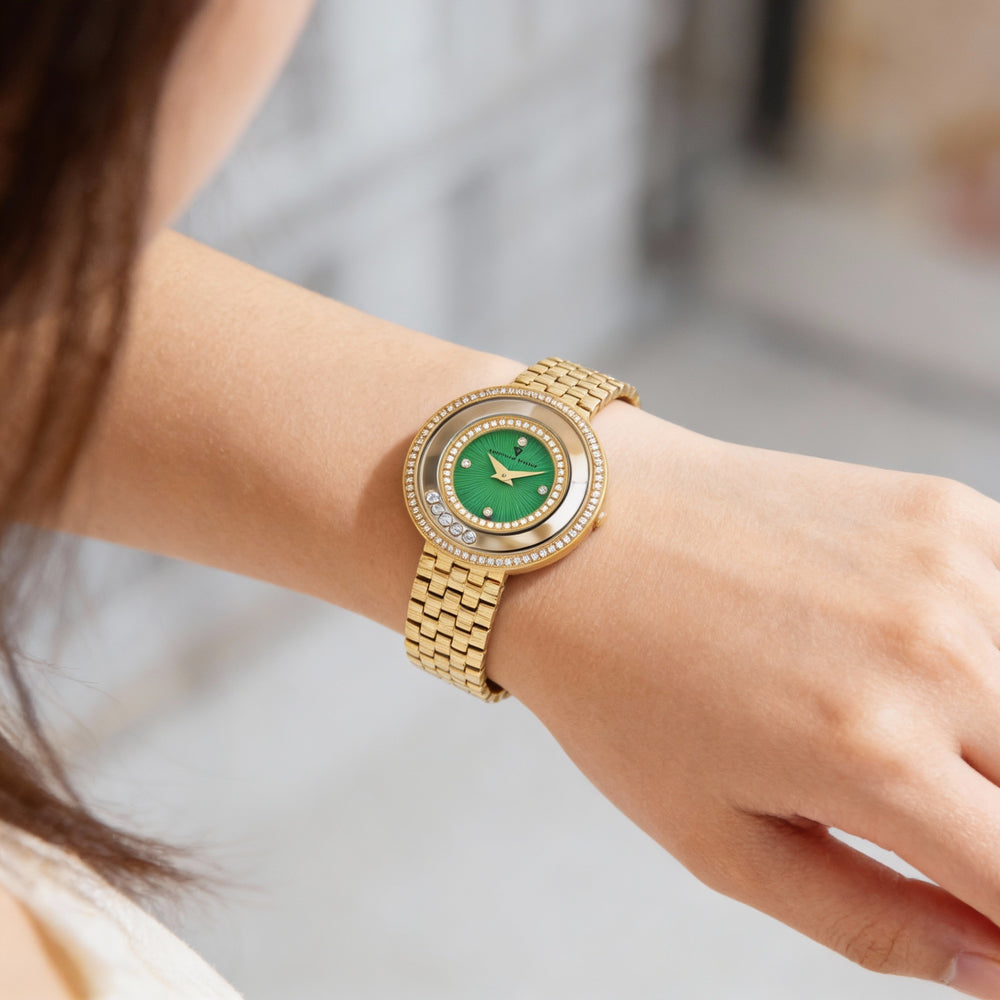 Reloj de cuarzo para mujer de Christian Van Sant, acero inoxidable, esfera verde, resistente al agua.