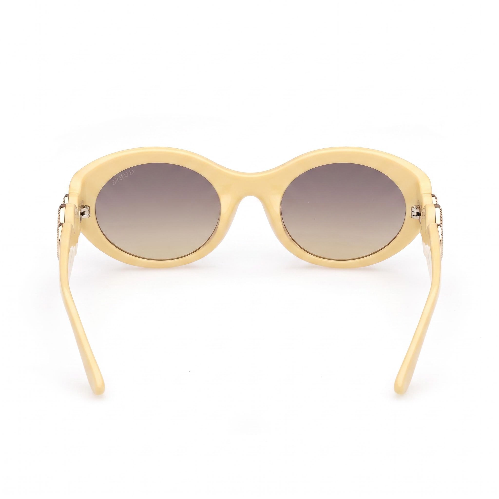 GUESS Women's Oval Peony Plastic Sunglasses, Shiny Light Yellow Frame, Gradient Smoke Lenses, Non-Polarized, 100% UV Protection, 53mm, Photo 4