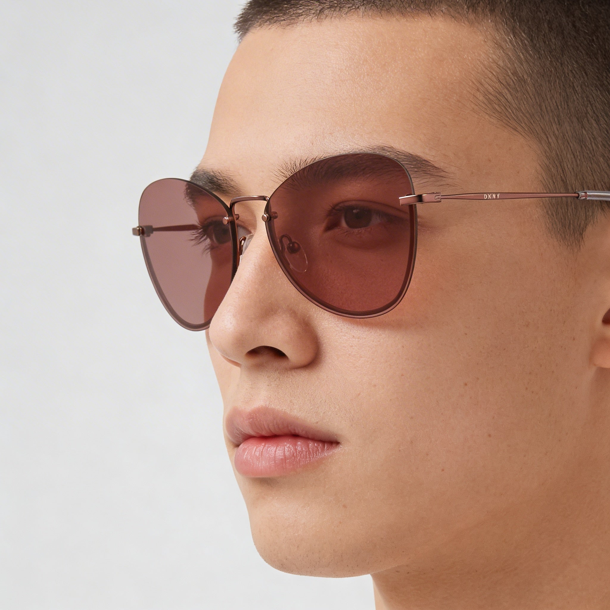 DKNY Dk100s Unisex Butterfly Style Plastic Frame Sunglasses in Mauve with Non-Polarized Acetate Lenses and UV Protection, Photo 4