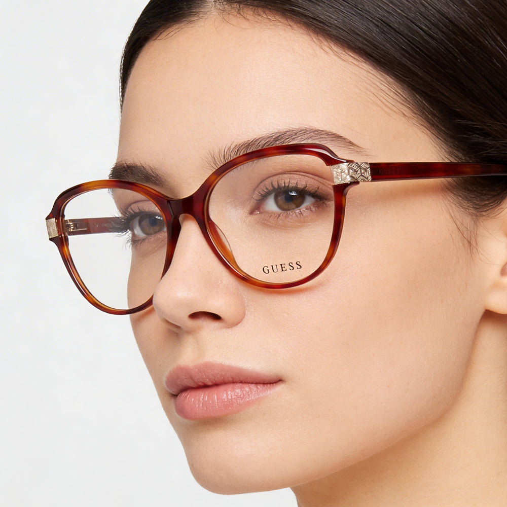 Gafas de vista modernas GUESS para mujer con montura de plástico color habano rubio y lentes de policarbonato transparente 55-16-140