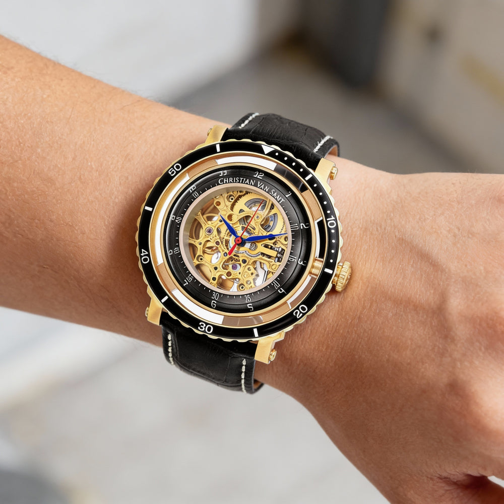 Reloj automático Christian Van Sant para hombre, caja de acero inoxidable en tono dorado con esfera esquelética, cristal de burbuja y correa de piel.