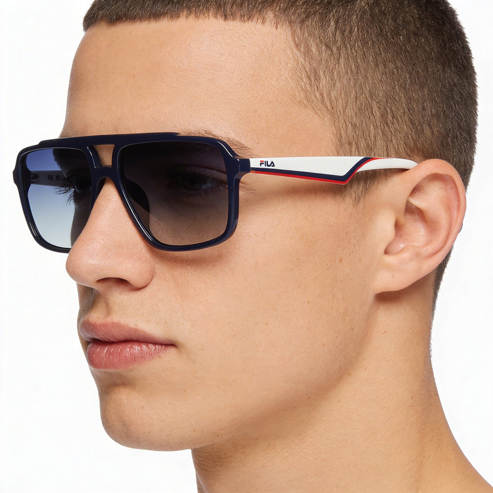 Gafas de sol Fila SFI460 Casual Navigator para hombre, montura azul, protección UV y lentes azules degradados, 57-16-145