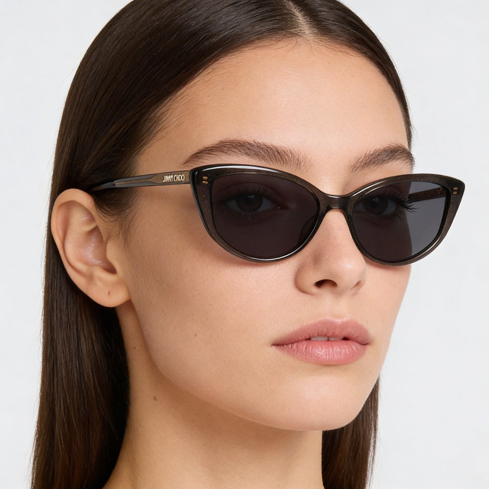 JIMMY CHOO Gafas de Sol de Mujer Cat Eye, Montura de Plástico Gris con Purpurina, Lentes Grises con Purpurina, 100% Protección UV, 56mm
