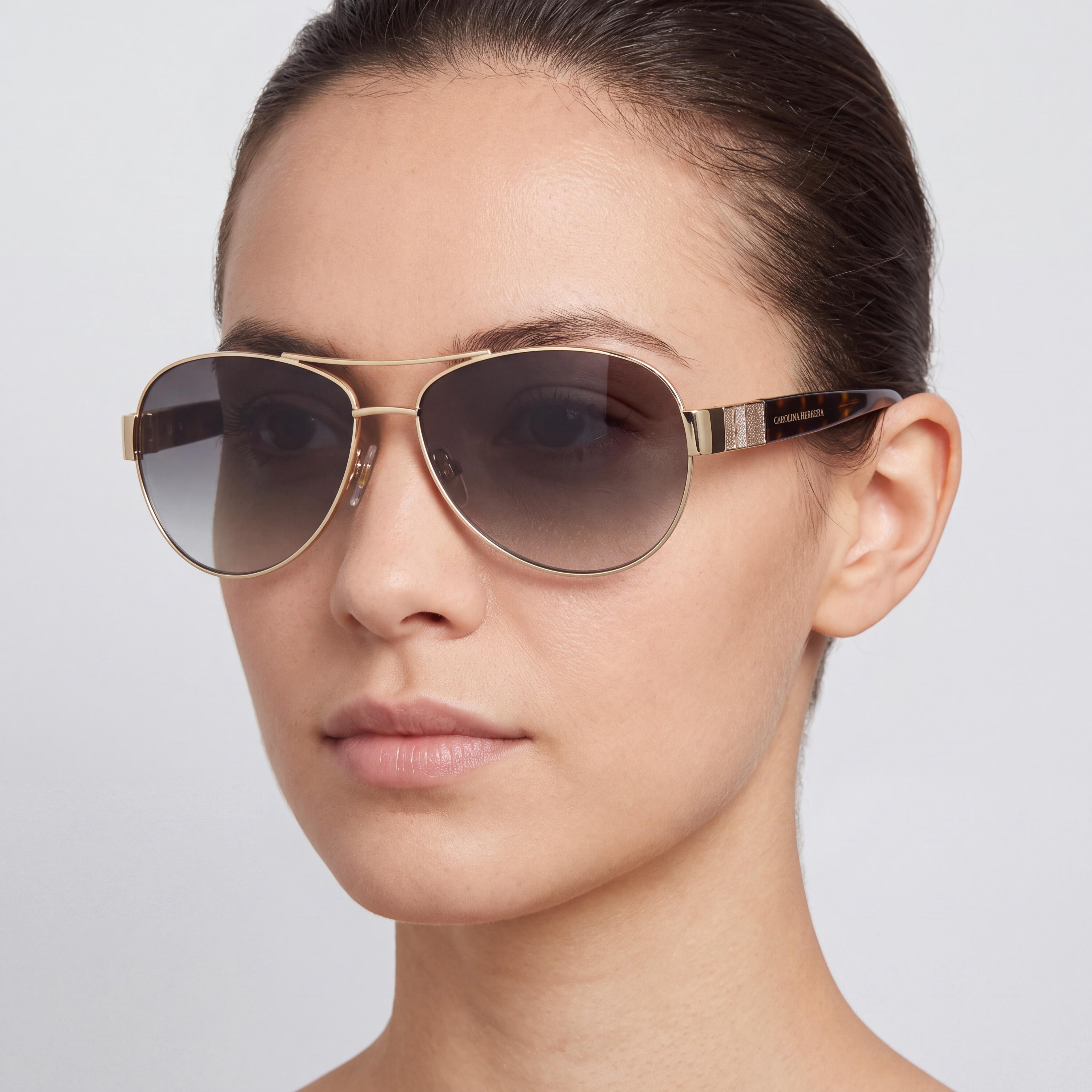 Gafas de sol clásicas unisex Carolina Herrera con montura metálica de oro rosa y protección UV de policarbonato de 59 mm, Photo 4