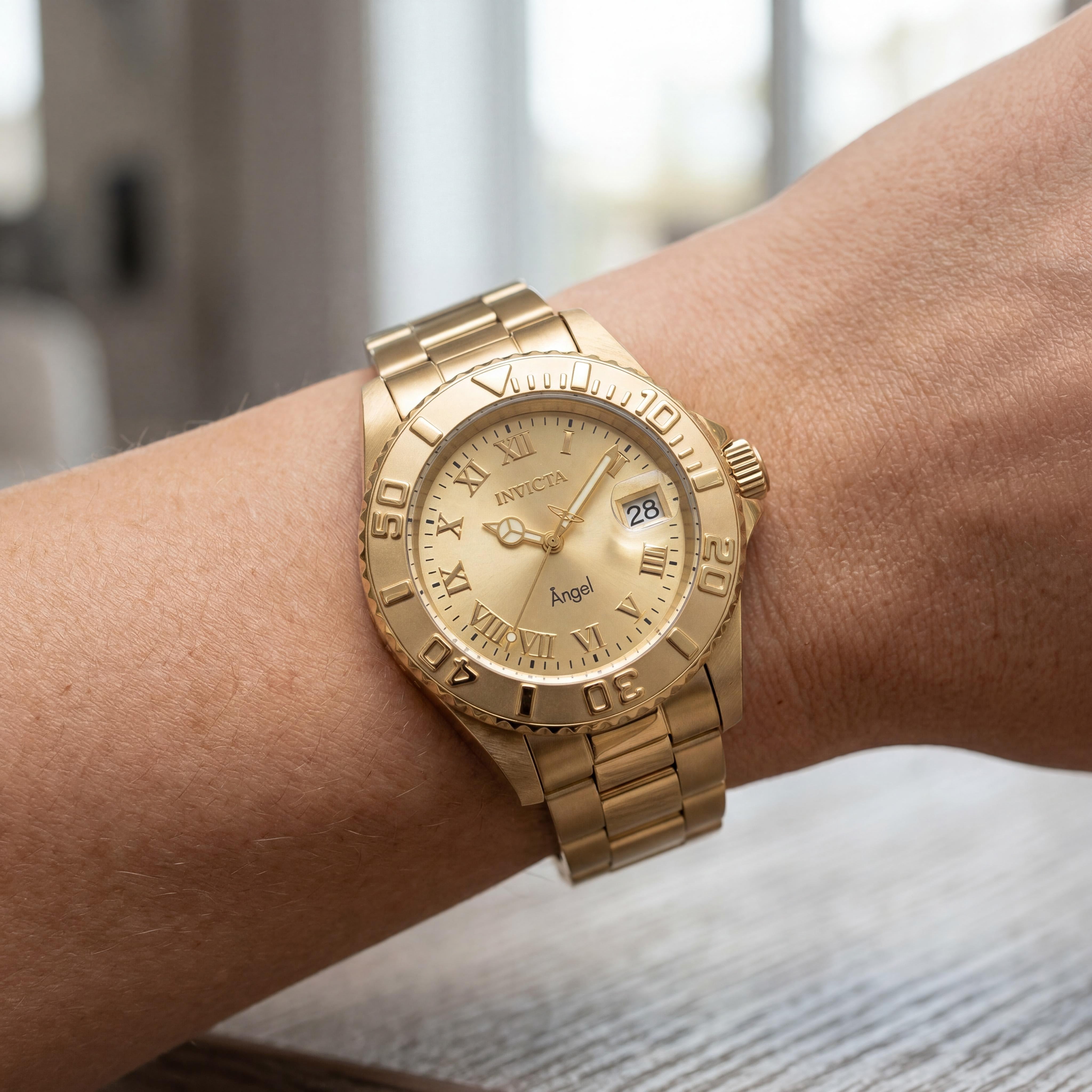 Invicta Angel 16849 Reloj de cuarzo de acero inoxidable con esfera dorada para mujer 40mm Resistente al agua 200m, Photo 4