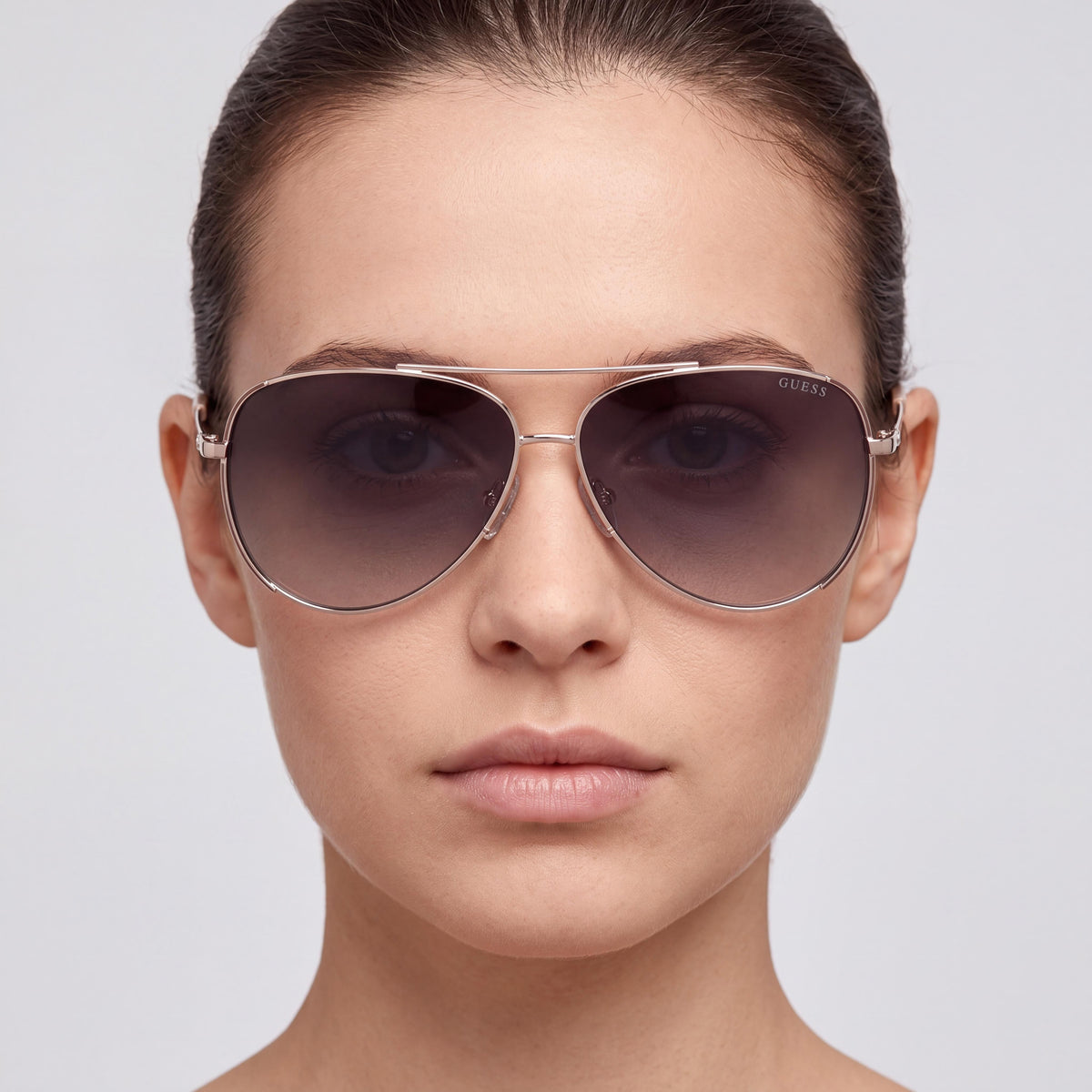 GUESS Gu00193 Gafas de sol de mujer con montura de metal dorado pálido brillante, lentes ahumadas degradadas y protección UV 58 mm, Photo 4