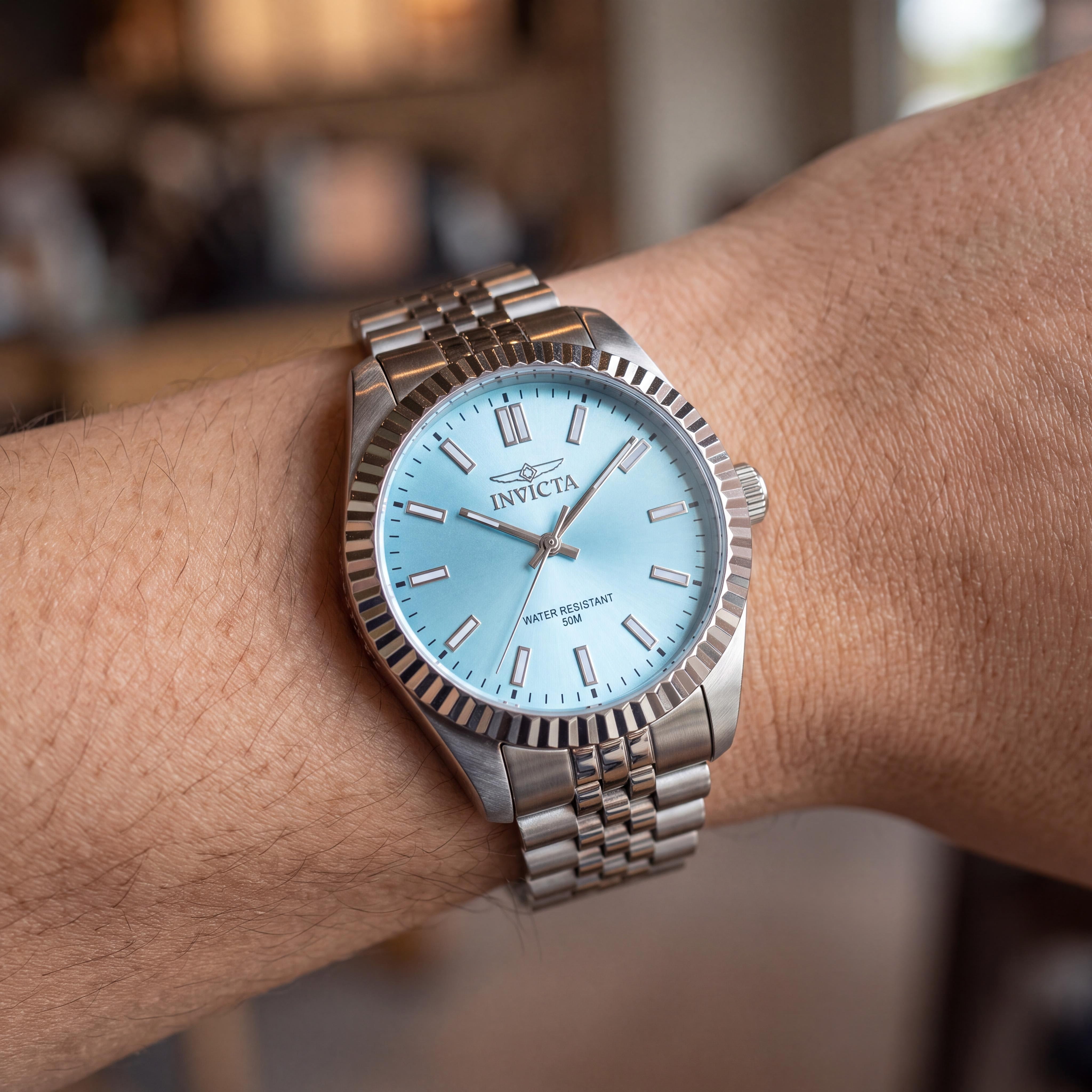 Invicta Specialty 48907 Reloj de pulsera de cuarzo unisex con caja de acero inoxidable de 36 mm plateada y esfera azul, Photo 4