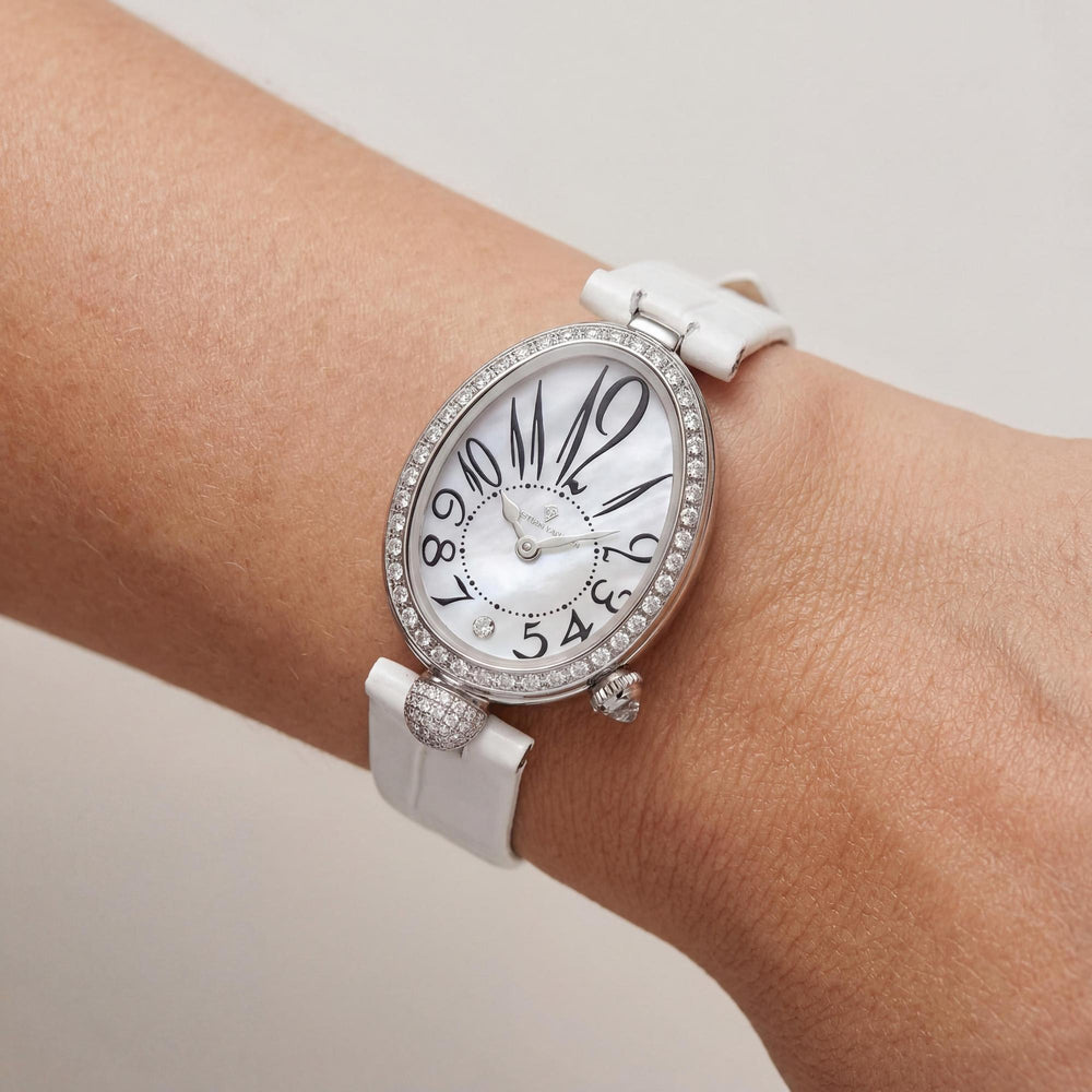 Reloj de cuarzo clásico Christian Van Sant para mujer, resistente al agua, con correa de piel blanca y esfera de nácar.