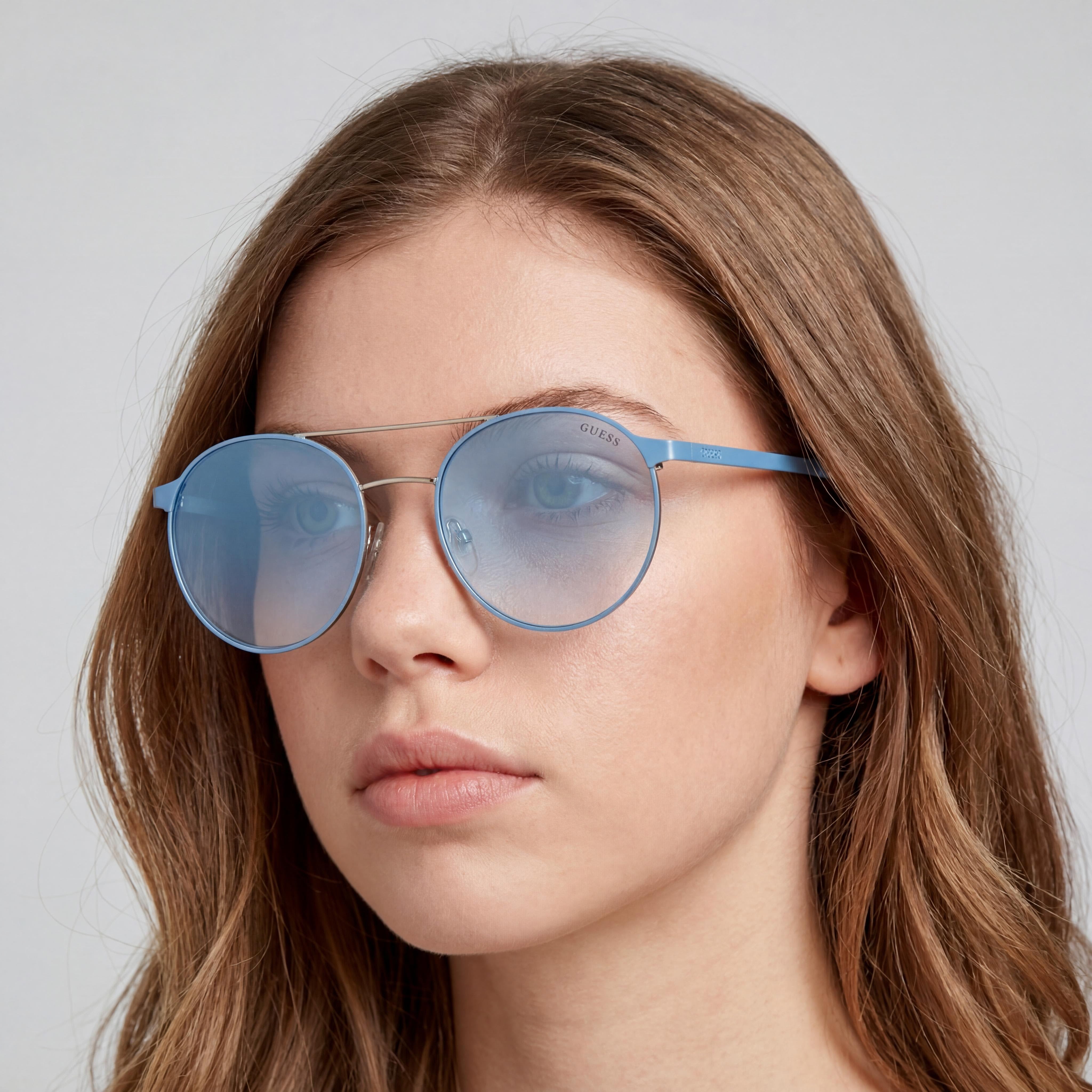 Guess Gu3023 Women's Anti-Reflective Rounded Metal Light Blue & Blue Mirror Frame Sunglasses with Blue Mirror Lenses 52mm, Photo 4