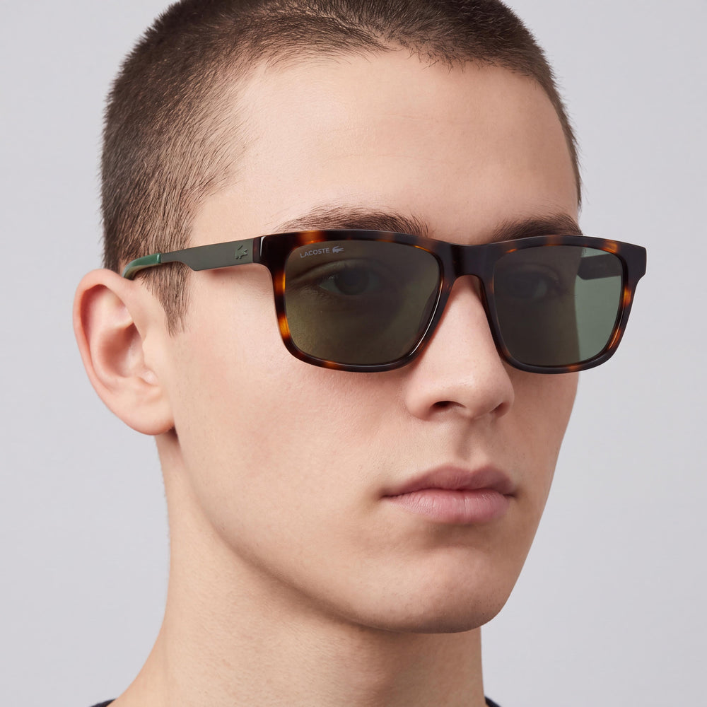 Lacoste L6025s Unisex INJECTED Gafas de sol con montura Habana Lente de policarbonato verde sólido Protección UV 400 56-17-145mm