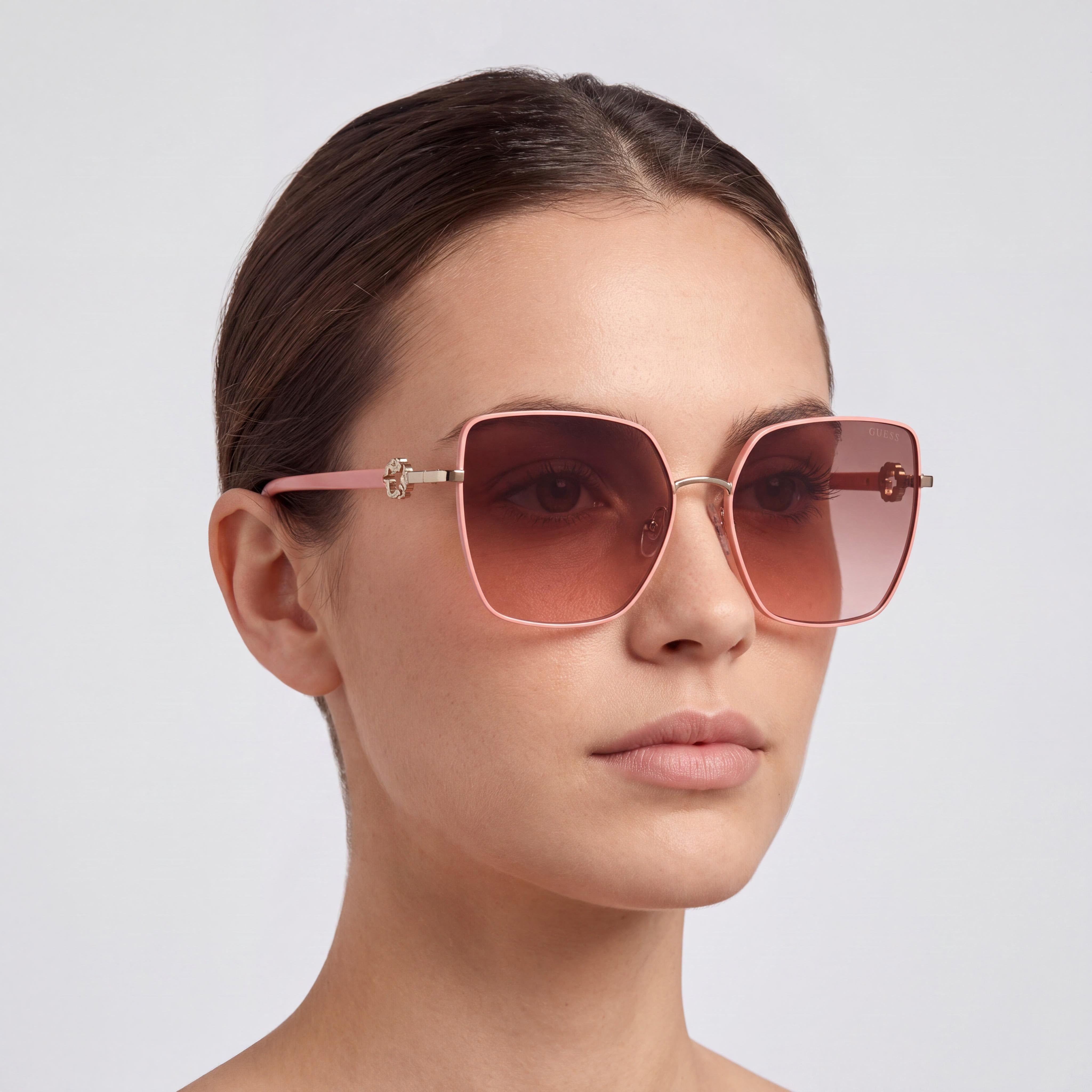 GUESS GU7790 Gafas de sol de metal de mariposa para mujer Marco dorado degradado marrón Lentes degradado naranja a oscuro 61 mm, Photo 3