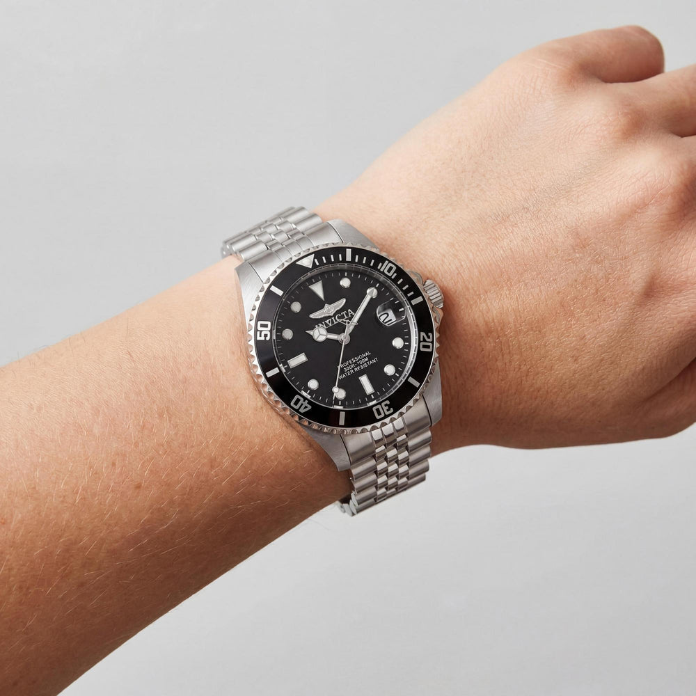 Reloj Invicta Pro Diver para mujer, caja de acero inoxidable plateada de 34 mm, esfera negra, cuarzo, fecha, resistente al agua hasta 100 m.