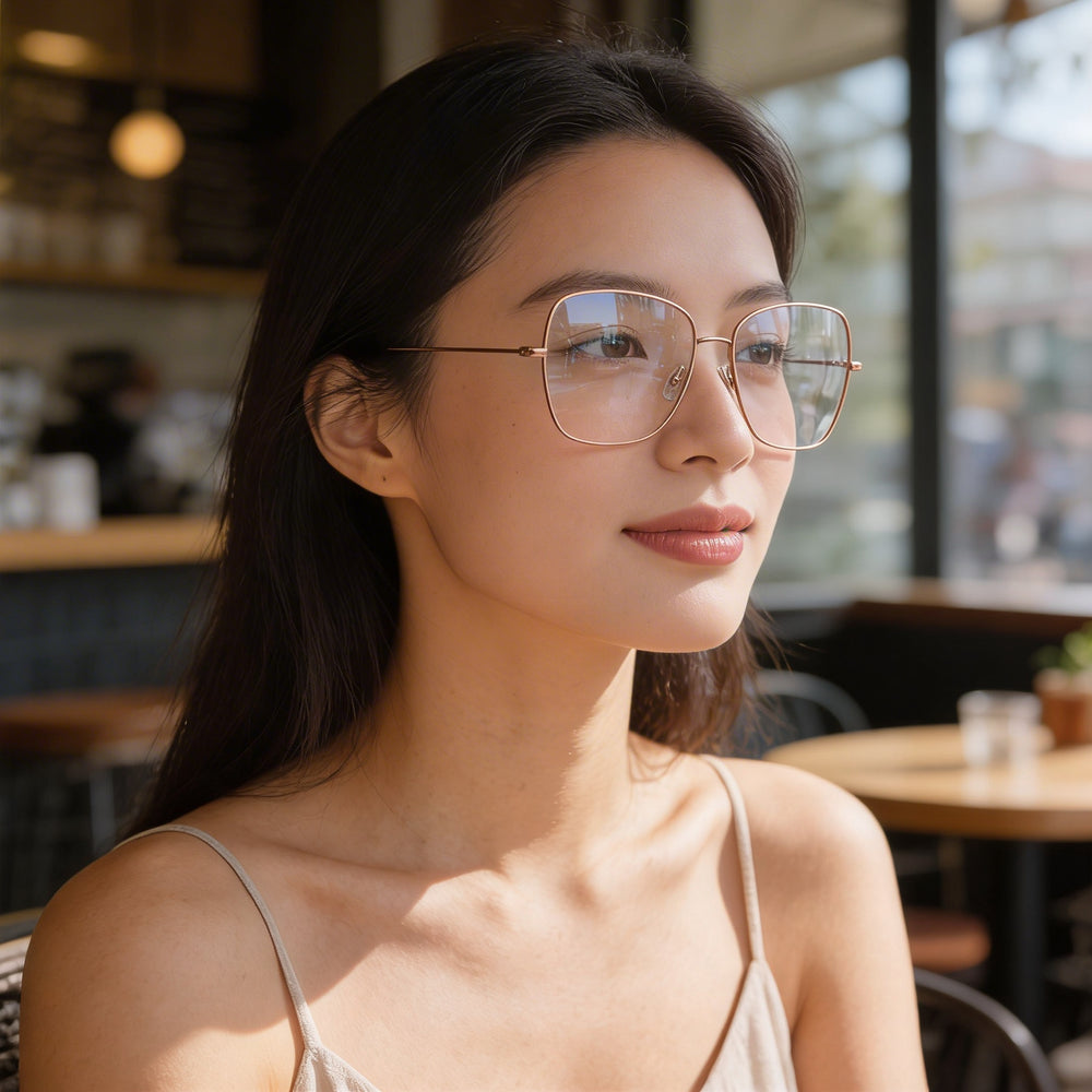 Gafas Hugo Boss Boss 1214 de titanio para mujer con montura de cobre dorado y lentes no metálicas rojo dorado de 55 mm