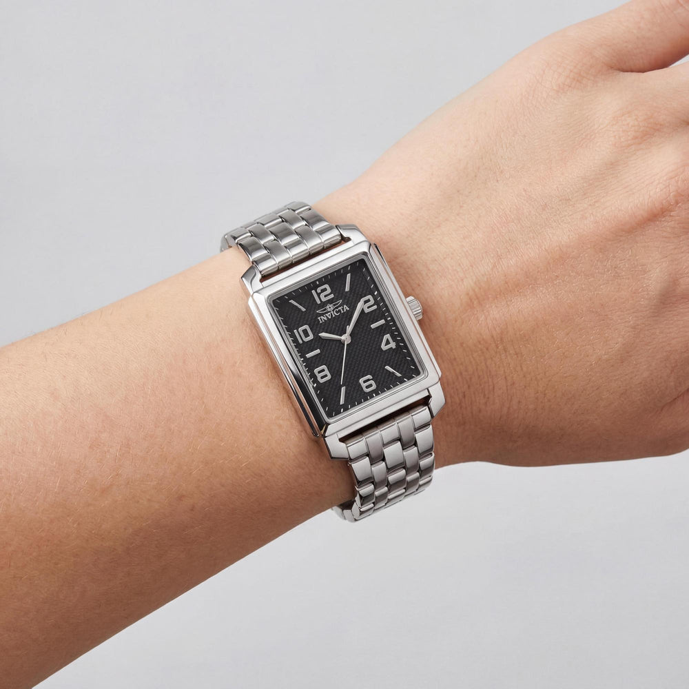 Reloj de cuarzo Invicta Fashion para mujer, caja de acero plateada, correa de acero inoxidable, esfera negra, 24,5 mm