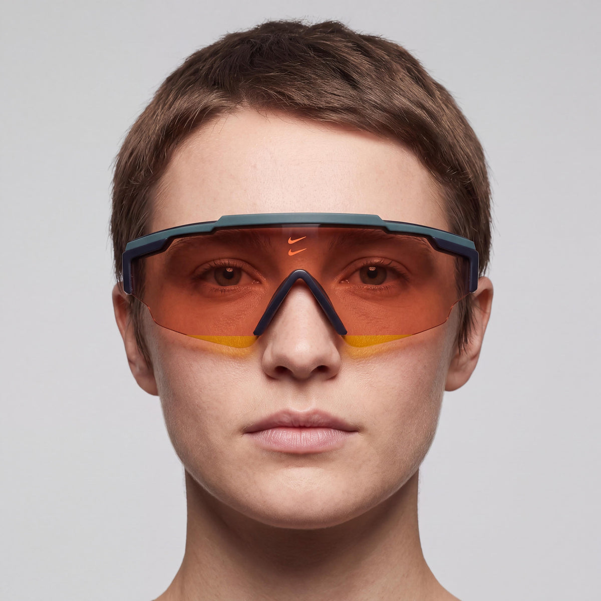 NIKE Modern Unisex Sunglasses featuring a Teal Orange Plastic Frame and Orange Plastic Lenses, with a 66mm Lens Width, Photo 3