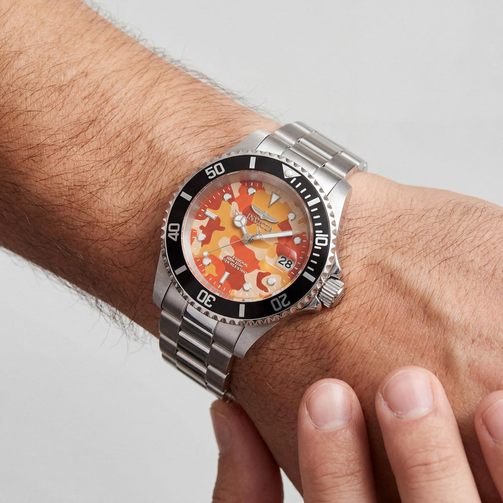 Reloj Invicta Pro Diver 48569 para hombre, de cuarzo, caja de acero inoxidable de 40 mm, esfera naranja, resistente al agua hasta 20 ATM.