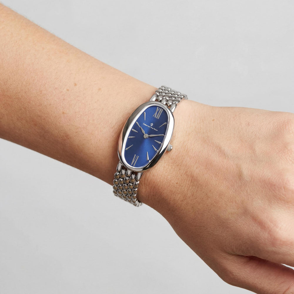 Reloj de cuarzo Christian Van Sant para mujer con esfera azul, caja y pulsera de acero inoxidable, resistente al agua.