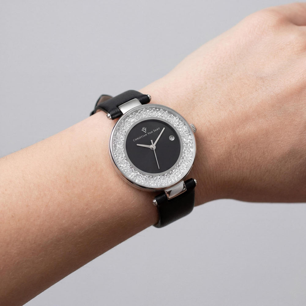 Reloj de cuarzo negro para mujer de Christian Van Sant con fecha y cristal mineral resistente a arañazos.