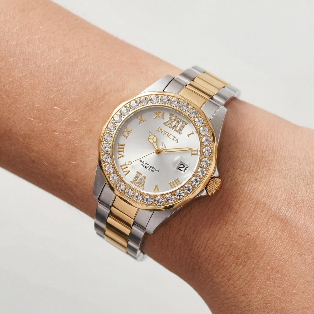 Reloj Invicta Pro Diver 20215 para mujer, de acero inoxidable bicolor, 38 mm, esfera plateada con efecto rayos de sol y cristales engastados, resistente al agua.