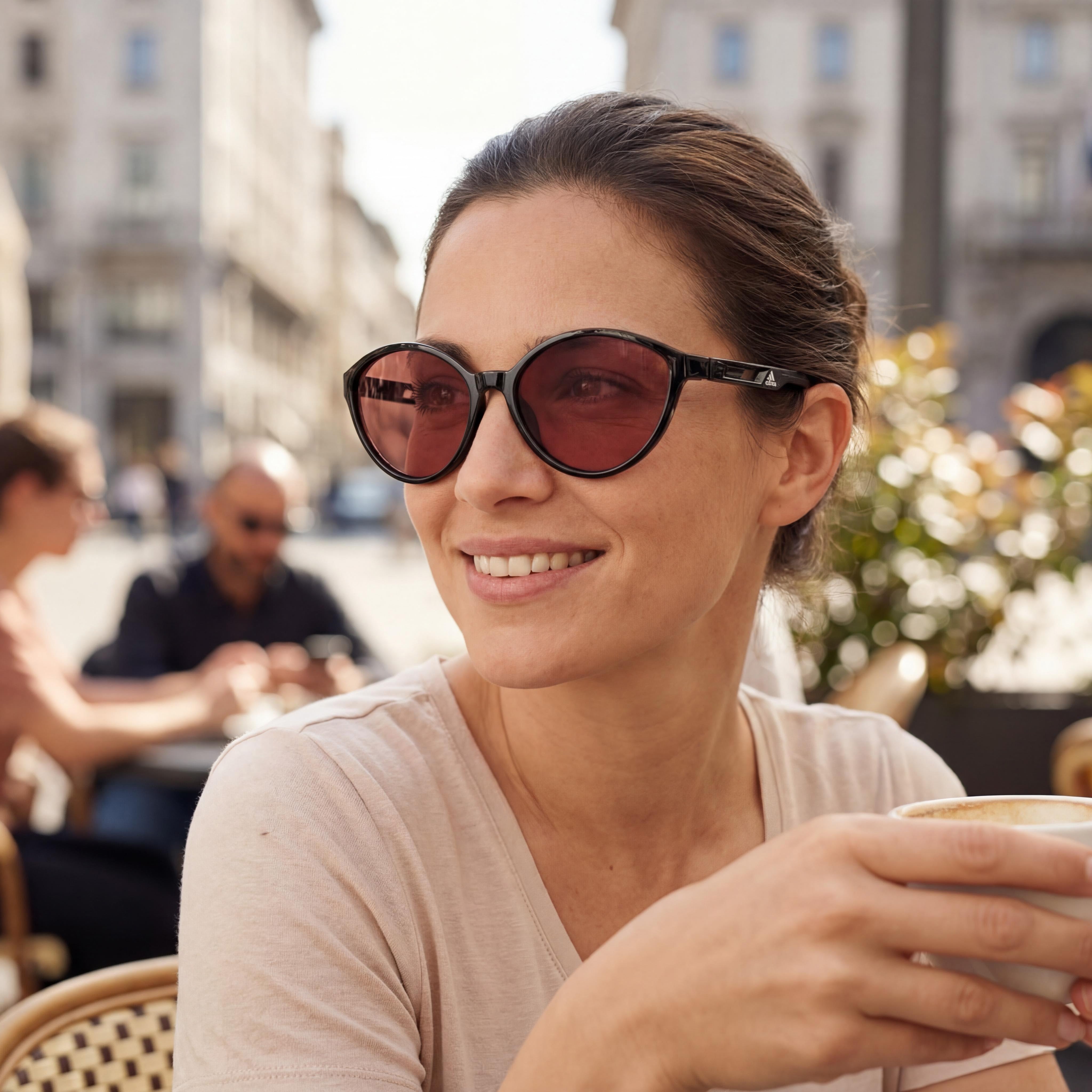 Gafas de sol deportivas Adidas para mujer, de plástico negro brillante con lentes moradas y protección UV de 61 mm., Photo 4