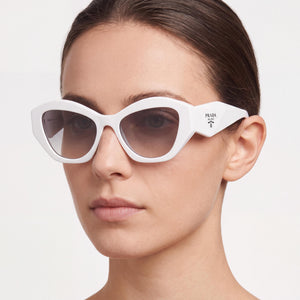 Prada 142130 Cat Eye Sunglasses Women — side view, Non-Polarized Gray Gradient lens