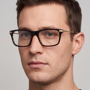 Puma PU0205O Rectangle Eyeglasses Men — side view, Black Plastic temples