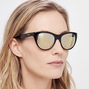 Revo RE 1037 Cat Eye Sunglasses Women — side view, Non-Polarized Blue Water lens